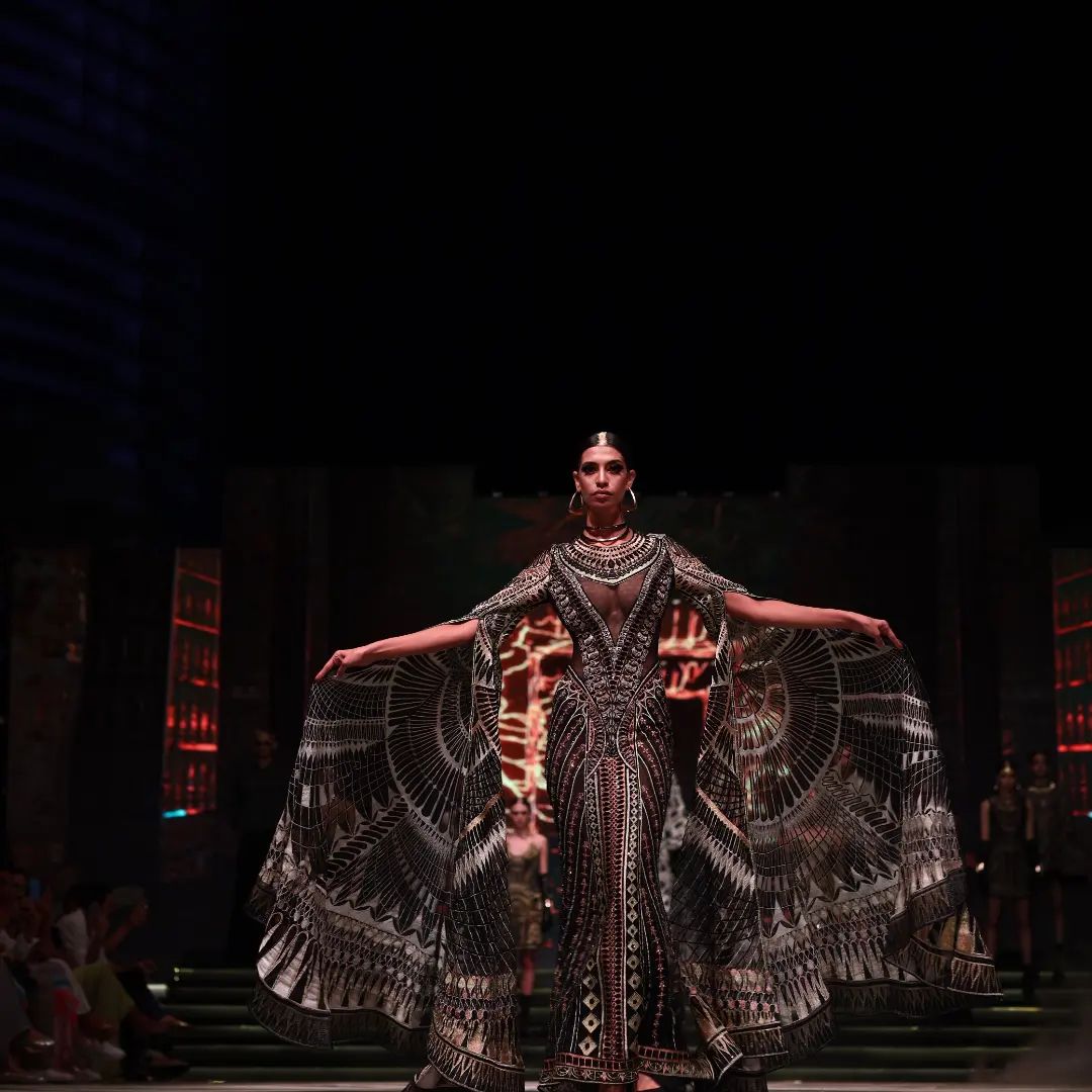 Step into a world of grandeur and elegance as international fashion designer