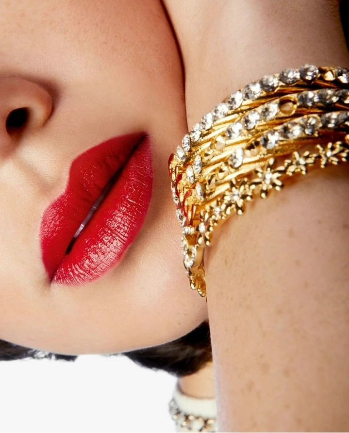 Unleash your inner confidence with this bold red lipstick by Chanel.